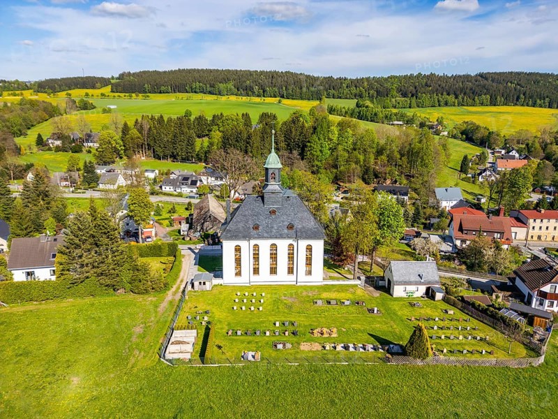 Aerial view, drone photo: Schwarzbach church and cemetery, forest and blooming meadows in the back, town of Elterlein, Ore Mountains, Saxony, Germany
