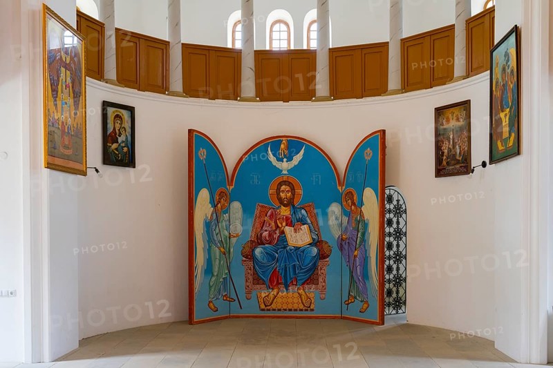 Iconostasis with central image of Christ and angels. Bright church surrounded by religious paintings, German Evangelical Lutheran Church of the Redeemer, Schwabenstraße, village founded by Caucasian Germans, Asureti, Asureti, Elizabeth Valley, Lower Kartli region, Georgia