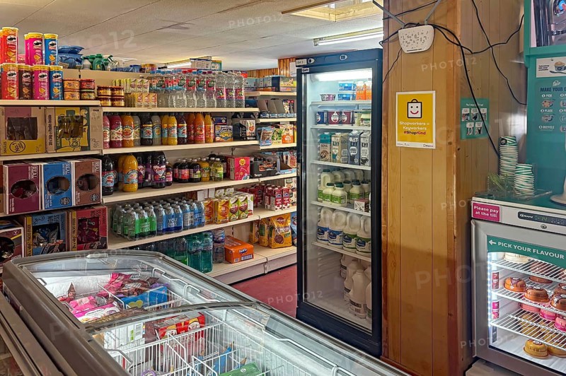 Small supermarket with fully stocked shelves and refrigerated products, shop on Westray Island, Orkney Islands, Scotland, Great Britain