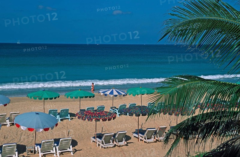 Palm tree, umbrellas and sun loungers at Karon Beach, two years in front of the tsunami, Ko Phuket, Thailand, December 2002, vintage, retro, old, historic