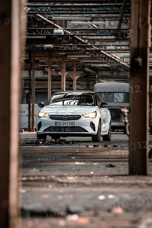 Front view of a car in an industrial, abandoned environment, Deer E-Car Sharing, Motorworld Rüsselsheim, Germany