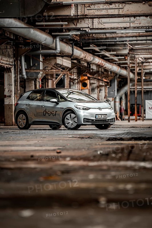 A vehicle is parked in an old factory with an industrial, raw character, Deer E-Car Sharing, Motorworld Rüsselsheim, Germany