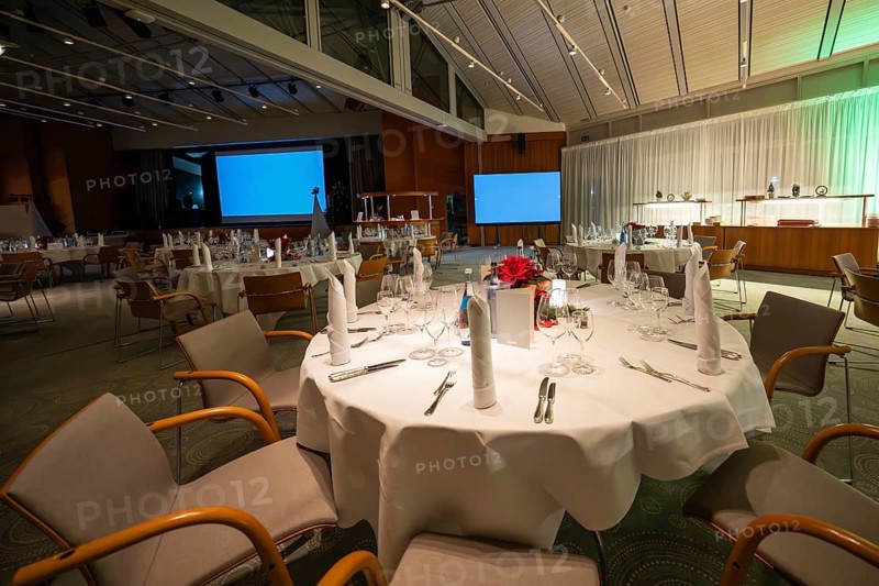 An empty function room with a closed presentation and festive decor, Christmas party Dekra Congresshotel Wart, Calw district, Germany