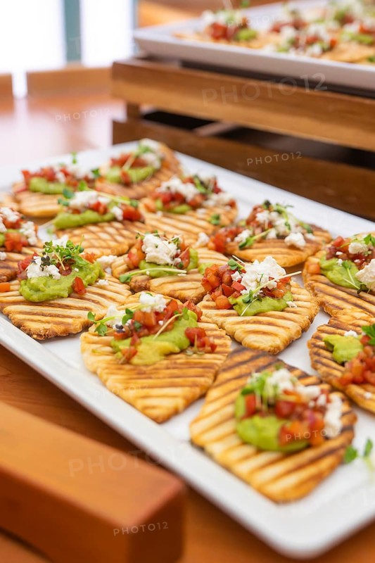 Creatively prepared tartines with guacamole and fresh garnish on wooden trays, Christmas party Dekra Congresshotel Wart, Calw district, Germany