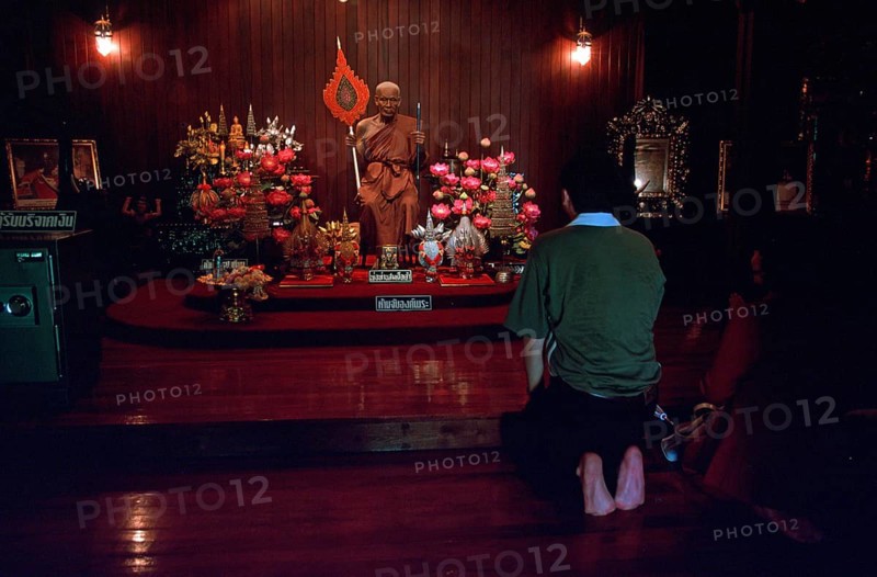 Wax monk at Wat Chalong monastery, believers praying, Ko Phuket, Thailand, December 2002, vintage, retro, old, historic