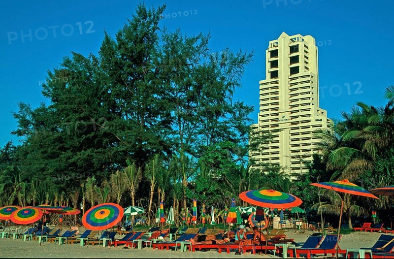 Skyscraper, umbrellas, people, Patong Beach, Ko Phuket, two years in front of the tsunami, Thailand, December 2002, vintage, retro, old, historic