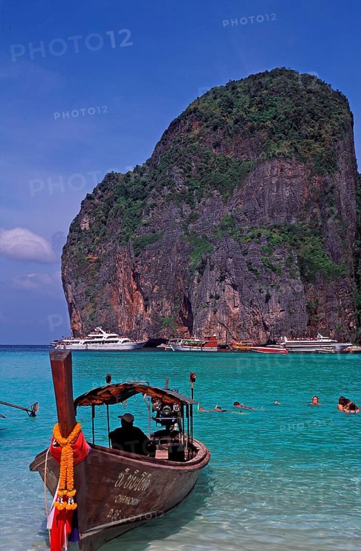 Longtail boat on Maya Bay beach, known from the movie The Beach, one year in front of the tsunami, Ko Phi Phi Le, Thailand, December 2002, vintage, retro, old, historic