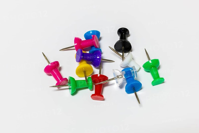 Different colored pencils lying on a white background, Germany