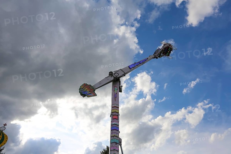 No limit carousel, fairground in Friedrichsau Ulm, folk festival, hustle and bustle, fair, ferris wheel, amusement park, amusement attraction, ride, blue sky, clouds, Ulm, Baden-Württemberg, Germany