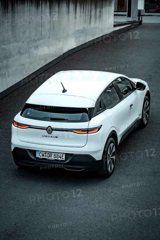Rear view of a white modern SUV on a paved road, Deer e-car sharing, Renault Megane, Calw, Germany