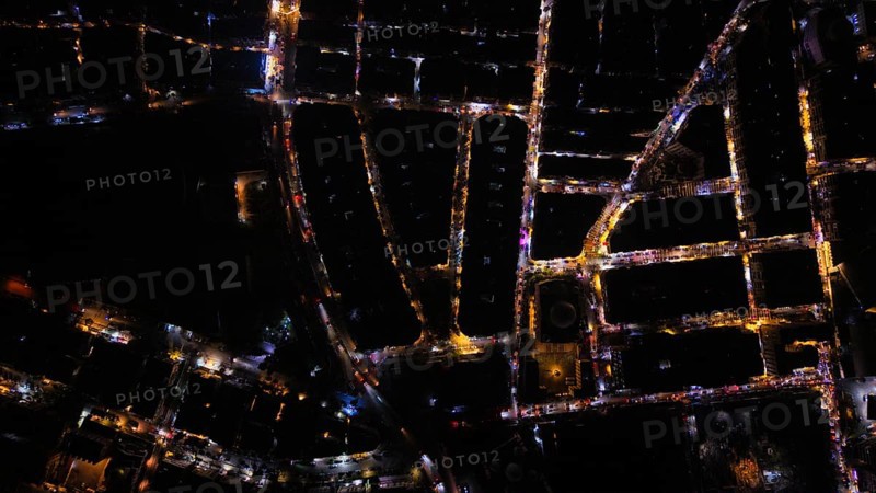 A Drone night view of Aleppo, Syria on December 19, 2025, showing illuminated streets, dense residential areas, and major traffic routes under the night sky, Aleppo, Aleppo, Syria
