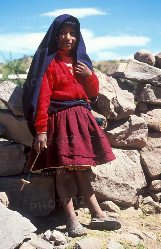 Little girl wearing traditional clothes on Isla Taquile in Lake Titicaca, Andean Highlands, Peru, South America, September 1997, vintage, retro, old, historic