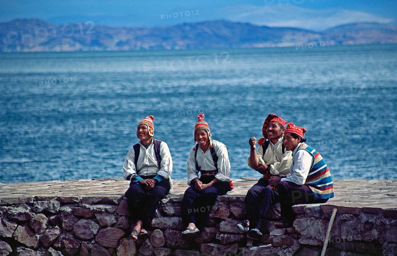 Men wearing traditional clothing on Isla Taquile in Lake Titicaca, Andean Highlands, Peru, South America, September 1997, vintage, retro, old, historic