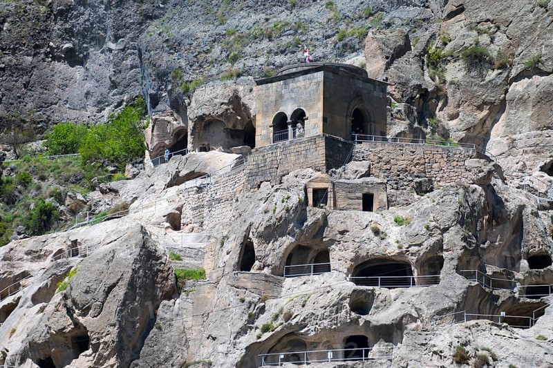 Monastery complex nestled in rocks. mixture of nature and historical architecture, cave city, cave monastery, Vardzia, Samtskhe—Javakheti region, Samtske Javacheti, Lesser Caucasus, Georgia