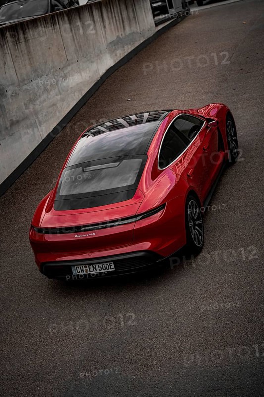 Red Porsche Taycan from a bird's eye view with focus on roof contours and rear, Porsche Taycan, Deer Carsharing, Calw, Germany
