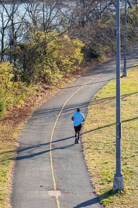 Washington, DC - A man jogs along the Annacostia Riverwalk Trail