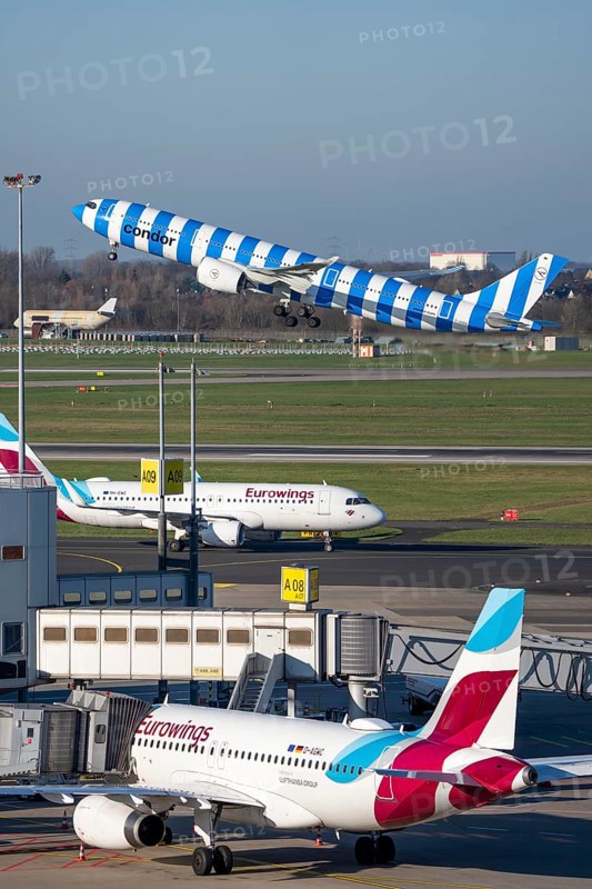 Eurowings Airbus aircraft at terminal A, Condor Airbus A330-900, taking off, Düsseldorf airport, DUS