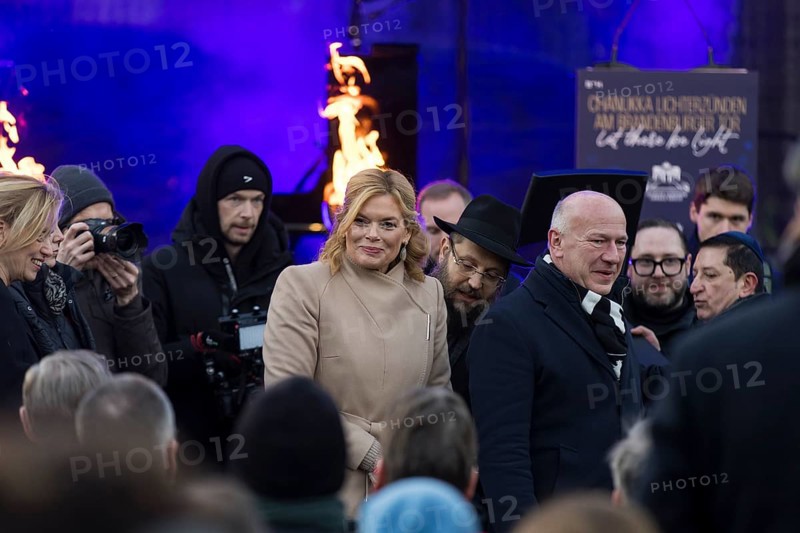 Julia Klöckner (President of the German Bundestag) and Kai Wegner (Governing Mayor of Berlin) at the arrival for the lighting of lights to mark 20 years of Hanukkah in front of the Brandenburg Tor tor, Berlin, 17 December 2025