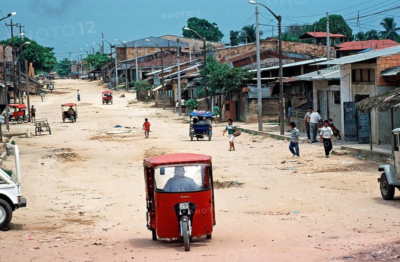 Street, houses, people, tuk-tuks, Iquitos, Peru, South America, September 1997, vintage, retro, old, historic
