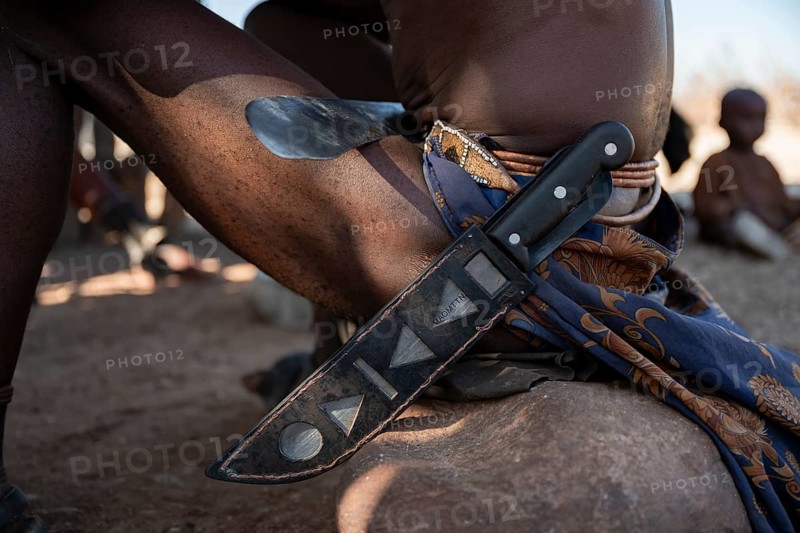 Detail, machete on a Himba belt, traditional Himba village, Kaokoveld, Kunene, Namibia