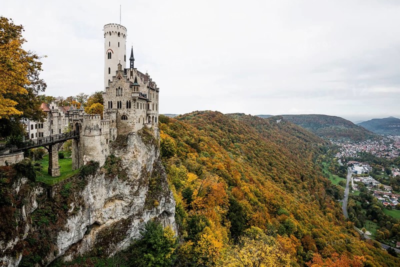 Castle and autumnal forest, Lichtenstein Castle, Honau, Echaz Valley, Swabian Jura, Baden-Württemberg, Germany
