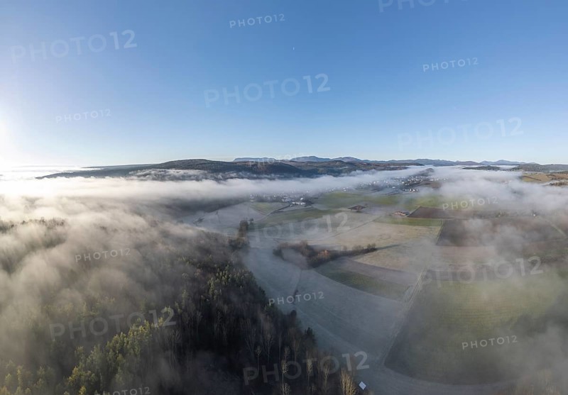 Aerial view of fog over fields and forest, St.Veit, Berndorf, Lower Austria, Austria