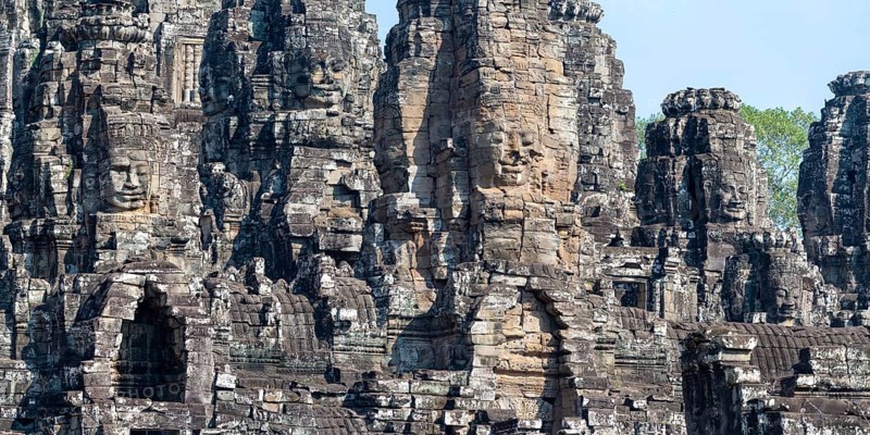 Panoramic picture of huge stone-carved faces of Bodhisattva Lokeshvara, also Avalokiteshvara, Bayon Temple, Angkor Thom, UNESCO World Heritage Site, Angkor Wat, Siem Reap, Cambodia
