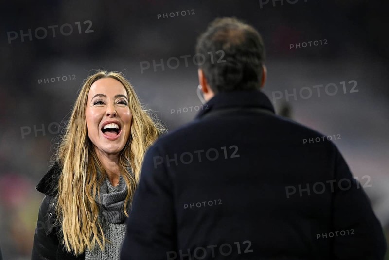 DAZN presenter reporter Sylvia Walker talking with TV expert Michael Ballack, laughs, Allianz Arena, Munich, Bavaria, Germany