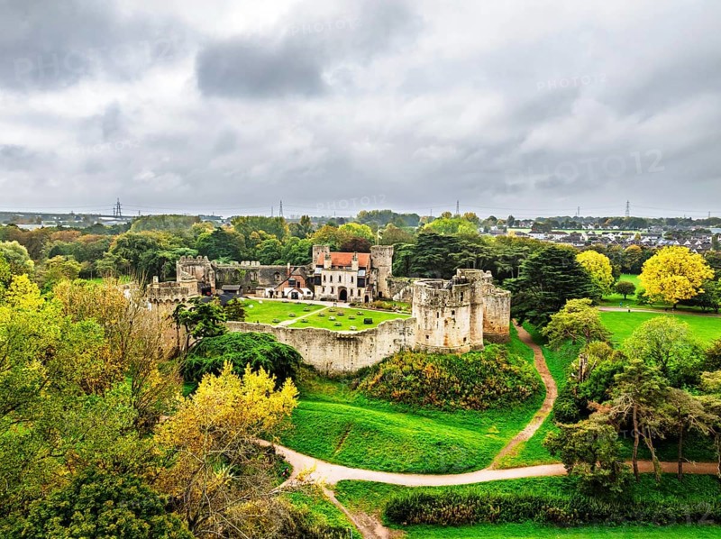 Autumn Colours over ruins of Caldicot Castle from a drone, Caldicot, Monmouthshire, Wales, UK