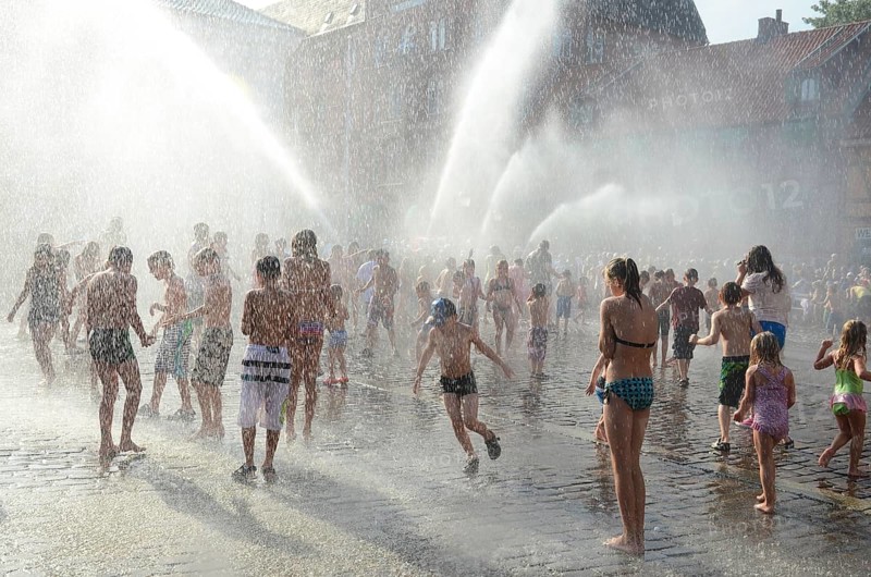 A popular event every year in August is when the Ystad Volunteer Fire Brigade takes the old fire pump made in 1850 to the square and sprays water on the assembled children, who are then baptized as true Ystad residents. Ystad, Skåne County, Sweden, Scandinavia