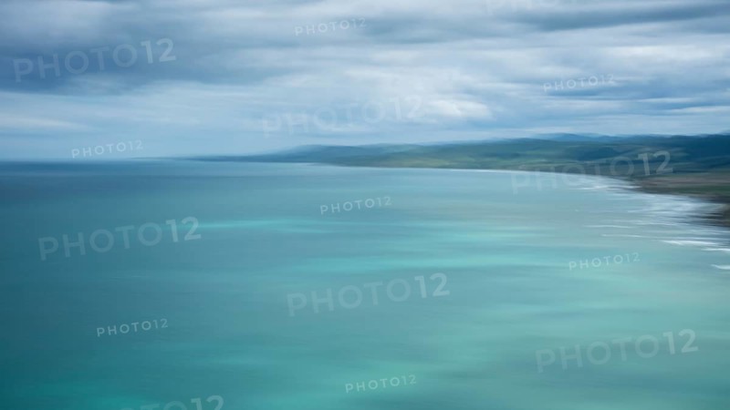 Wairarapa coast, sea, mountains, blurred, long exposure, ICM. Castlepoint, Wairarapa Coast, Wellington Region, North Island, New Zealand