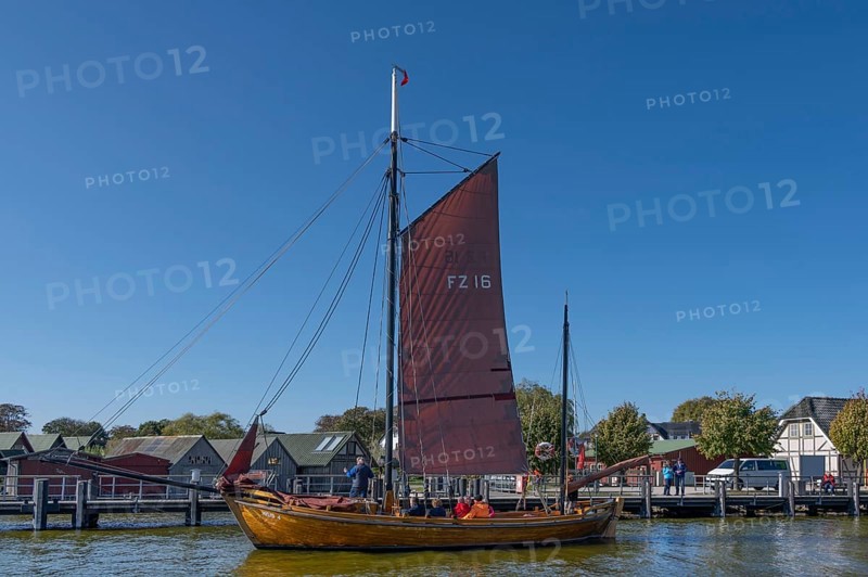 Zeesboot, former historic fishing boat in the port of Ahrenshoop, blue sky, Darß, Mecklenburg-Western Pomerania, Germany