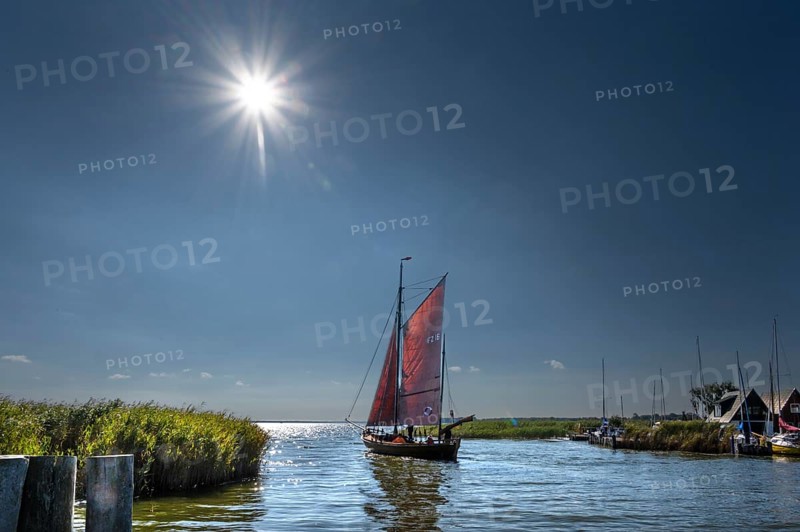 Zeesboot, former historic fishing boat, leaves the port of Ahrenshoop, Sonnenstern, Darß, Mecklenburg-Western Pomerania, Germany