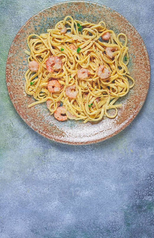 Spaghetti with shrimp, in cream sauce, top view, no people