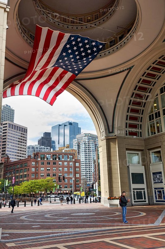 American flag fluttering, distinctive archway, Boston Harbor Hotel, Rowes Wharf, passers-by, Freedom Trail, Financial District, Downtown, Boston, Massachusetts, New England, USA