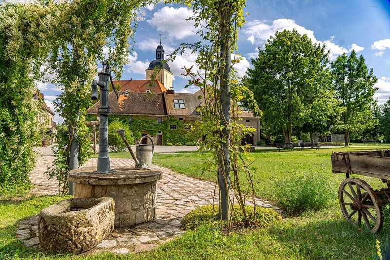 Hirschstein Castle or NeuHirschsteinCourtyard with Fountain, Hirschstein, Saxony, Germany