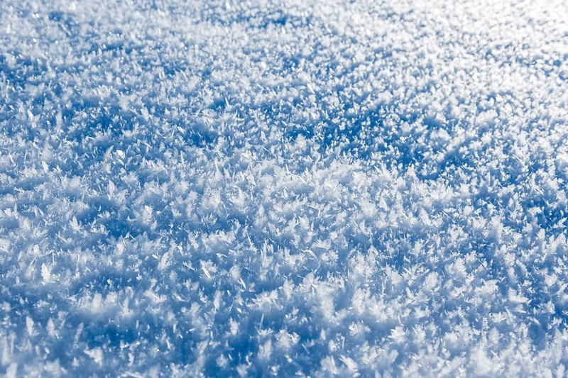 Close-up view of ice crystals on a blanket of snow giving a cool, wintry feeling, Bavaria, Germany