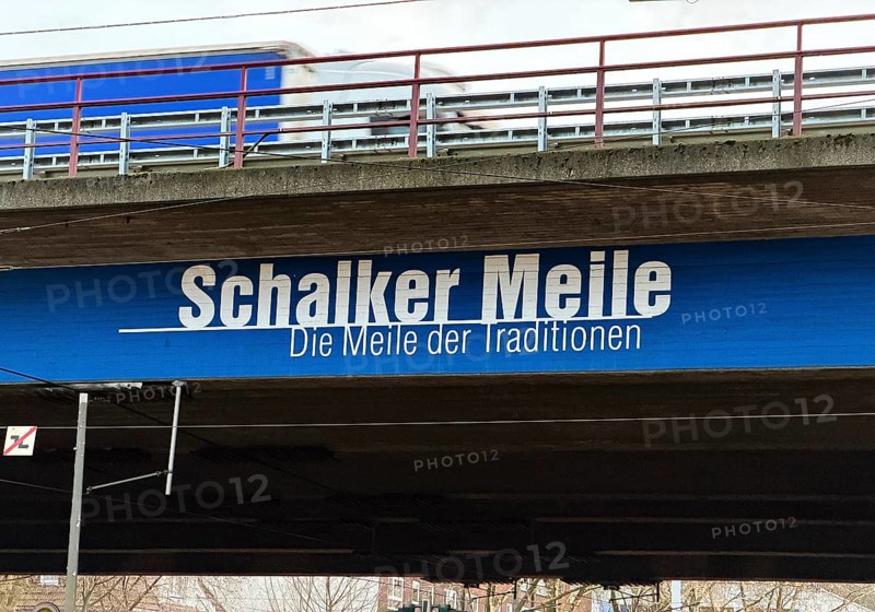 Schalker Meile logo on the A42 motorway bridge with blue and white truck, Gelsenkirchen, North Rhine-Westphalia, Germany