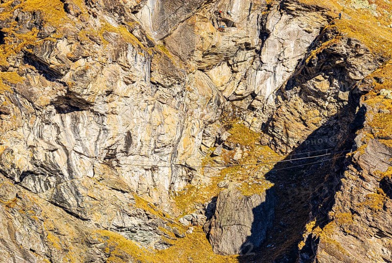 Suspension bridge on a via ferrata near the Lac de Moiry reservoir, Val d'Anniviers, Valais Alps, Canton of Valais, Switzerland