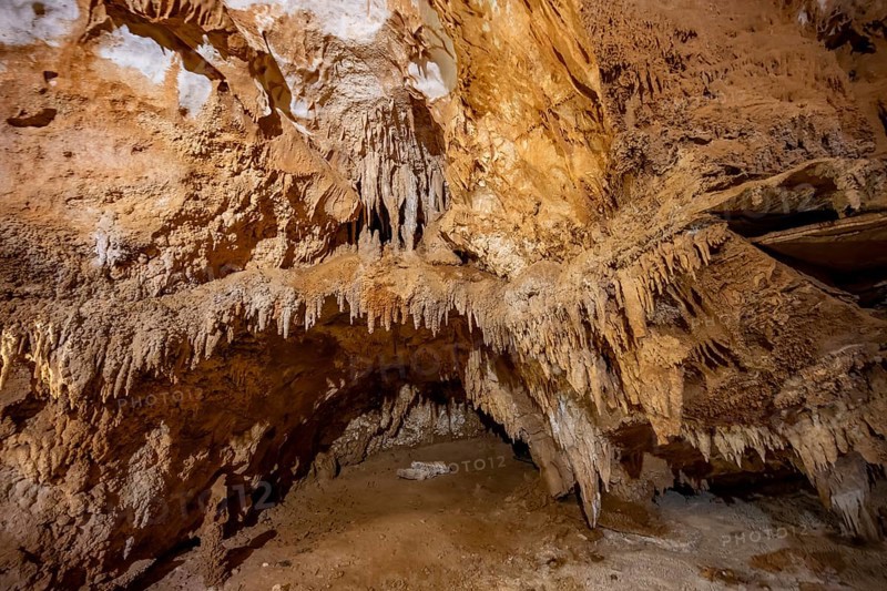 Stalactites and rock formations in a stalactite cave, Grotta del Fico, Gulf of Orosei, Baunei, Sardinia, Italy
