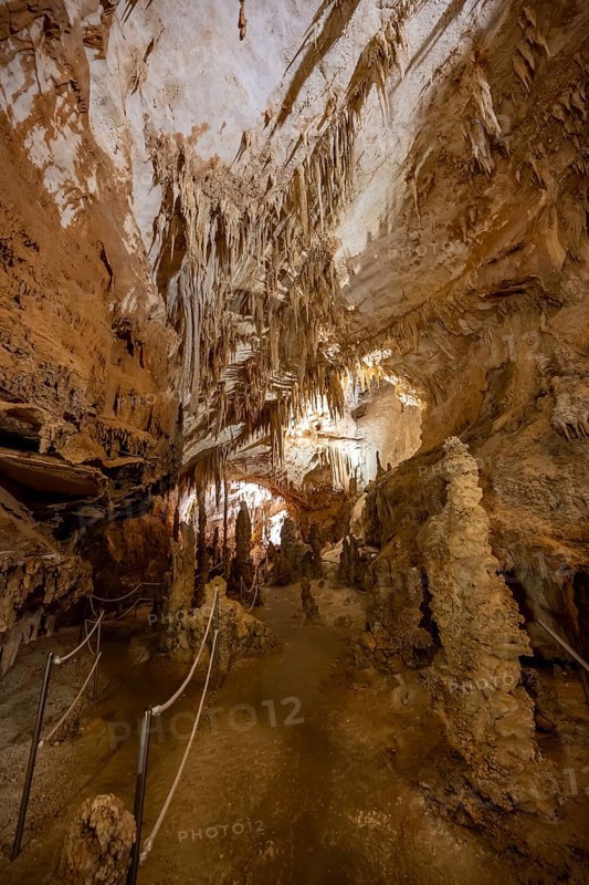 Stalactites and rock formations in a stalactite cave, Grotta del Fico, Gulf of Orosei, Baunei, Sardinia, Italy