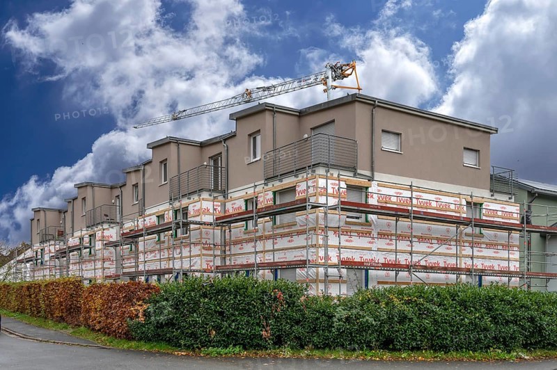 Installation of thermal insulation on a residential block, Eckental, Middle Franconia, Bavaria, Germany