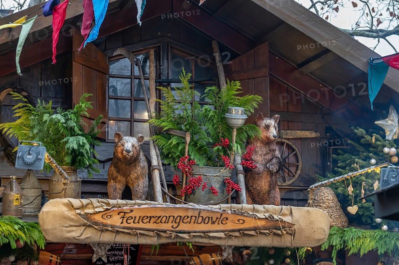 Decorative design at a stand with Feuerzangenbowle, Historic Christmas Market at Neustädter church square Erlangen, Middle Franconia, Bavaria, Germany