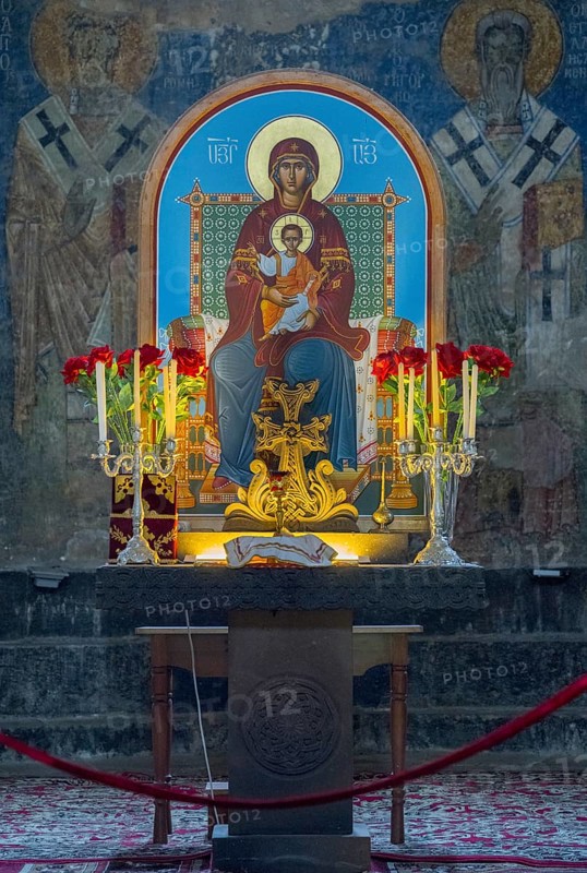 Icon of the Mother of God and Child Jesus surrounded by candles and flowers on an altar, Akhtala monastery, Akhtala town, Lorikeet province, Armenia