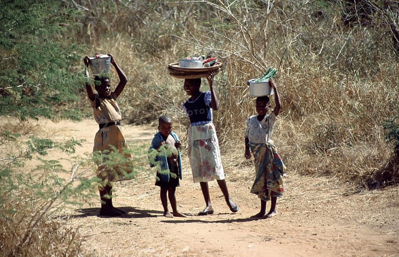 Girl with payloads, little boy, Malawi, Africa, June 2000, vintage, retro, old, historic