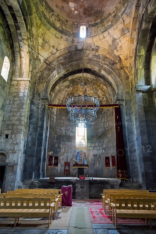 Spacious church room with altar, high ceiling and magnificent chandelier, Sanahin monastery, Sanahin village, UNESCO World Heritage Site, Lorikeet province, Armenia