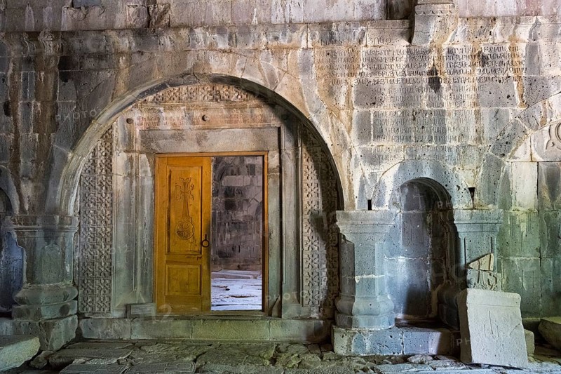 Ancient entrance with artfully carved wooden door and stone arches, Sanahin monastery, Sanahin town, UNESCO World Heritage Site, Lorikeet province, Armenia