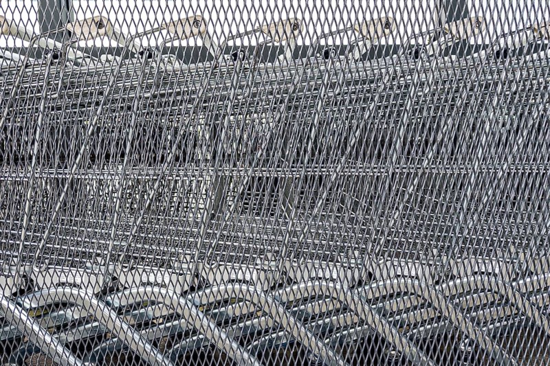 Close-up of several unused shopping carts, economic crisis, consumption