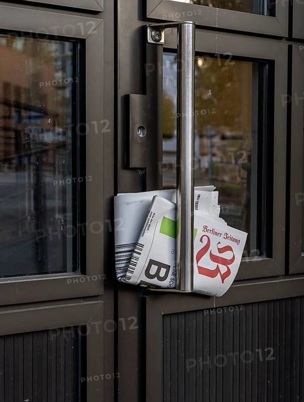 Traditional delivery of a daily newspaper, Berlin, Germany