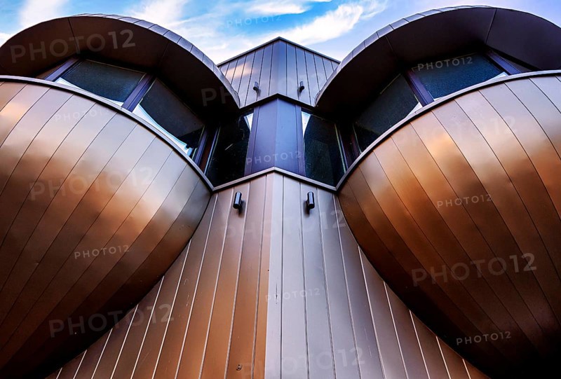 Futuristic balconies with bay windows on a prefabricated building from the sixties in Nikolaiviertel, Berlin, Germany